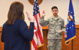 An Airman taking US Citizenship Oath